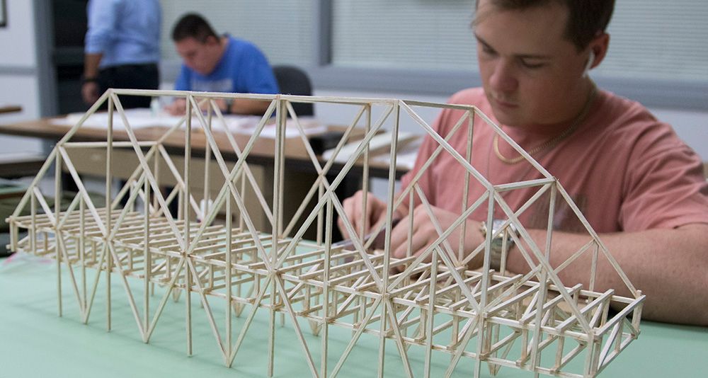 Student building a model