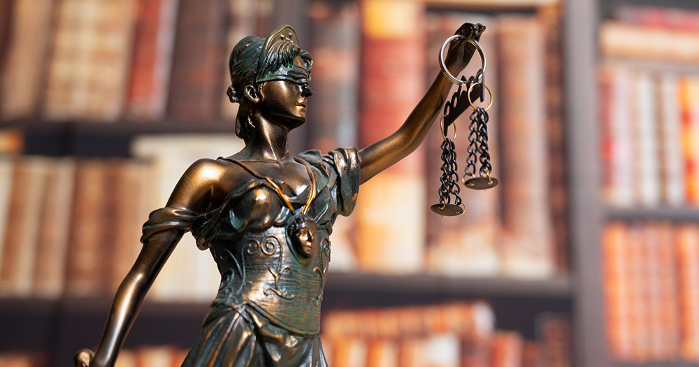 Statue of Justice holding scales