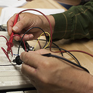 Engineering Student working with wires