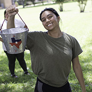 Woman holding a bucket with 