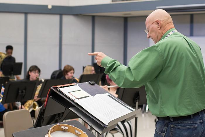 Wharton County Junior College Band Director Joe Waldrop leads students through a recent rehearsal. Waldrop will direct his final concert with the college on Thursday, March 27, at the Horton Foote Theatre on the Wharton campus.