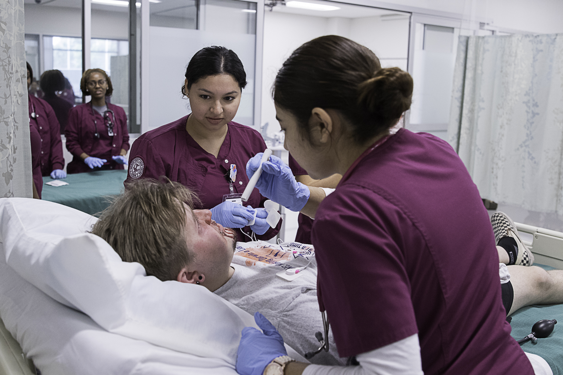 Wharton County Junior College nursing students participate in a training exercise at the Wharton campus. The college will launch a new Continuing Education Patient Care Technician program later this spring, providing 30 qualified students with full scholarships. 