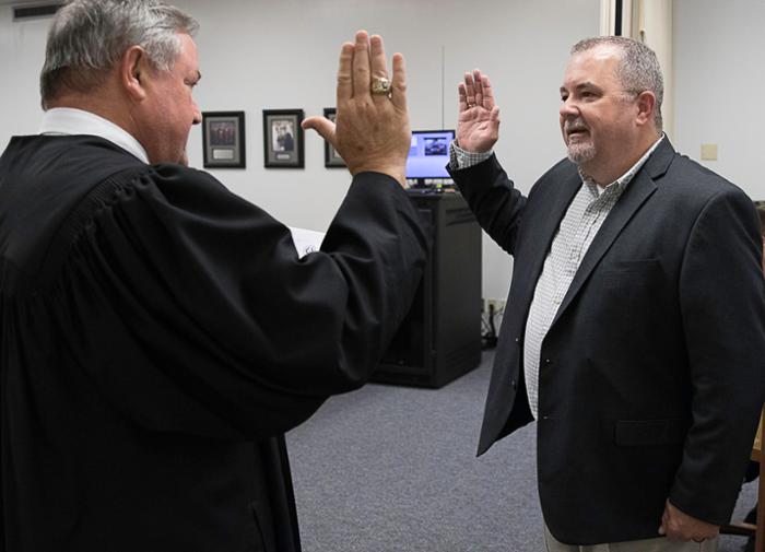 Elected members of the Wharton County Junior College Board of Trustees were officially sworn in during the regularly scheduled meeting on Tuesday, May 21, 2024. Pictured is State District Judge Randy Clapp, right, swearing in board member Terry Lynch, who was elected to Position 7.
