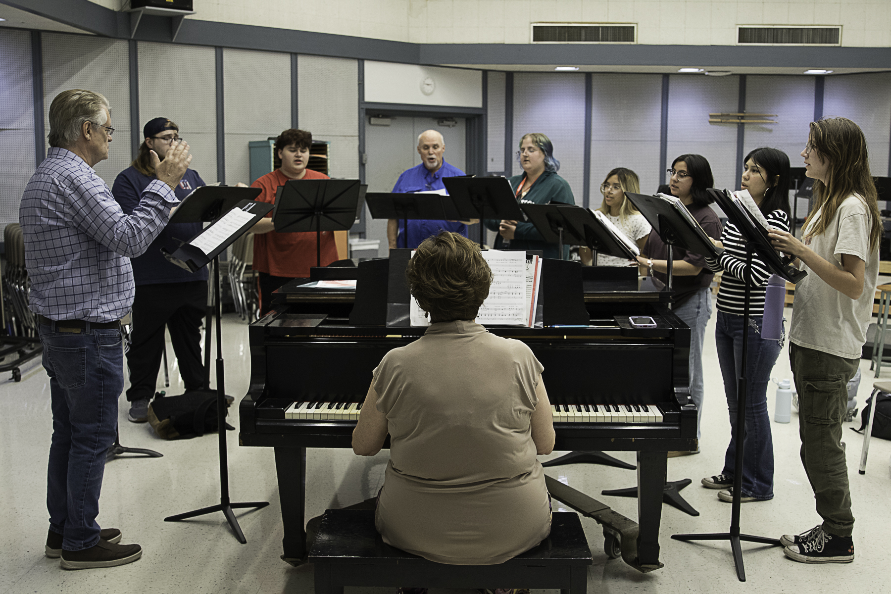 The Wharton County Junior College Choir will partner with the Wharton Community Choir for “Sounds of the Season.” Pictured, from left, are WCJC Choir Director Dr. Karl Paoletti, Spencer Cole of Needville, Matthew Mirelez of Bay City, Wharton Community Choir Director Mike Henderson, Gabrielle Tarlton of Victoria, Anahiyarith Rodriguez of El Campo, Alexis Alvarez of Bay City, Vanessa Flores of Needville and Julie Burns of Needville. Seated is WCJC Instructor of Music Debra Lemson. Not pictured is De’Maurion Leday of Bay City.  
