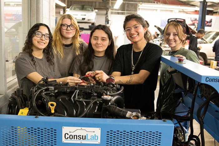 Wharton County Junior College Automotive Technology students demonstrate an engine trainer at the Wharton campus. A Jobs and Education for Texans (JET) grant will enable the program to purchase additional trainers and hydraulic lifts to provide students with more cutting-edge opportunities. Pictured, from left, are Automotive Technology students Scarlet Casas, Stacie Anderson, Alexa Ortiz, Alejandra Hoyos and Olivia Miller.