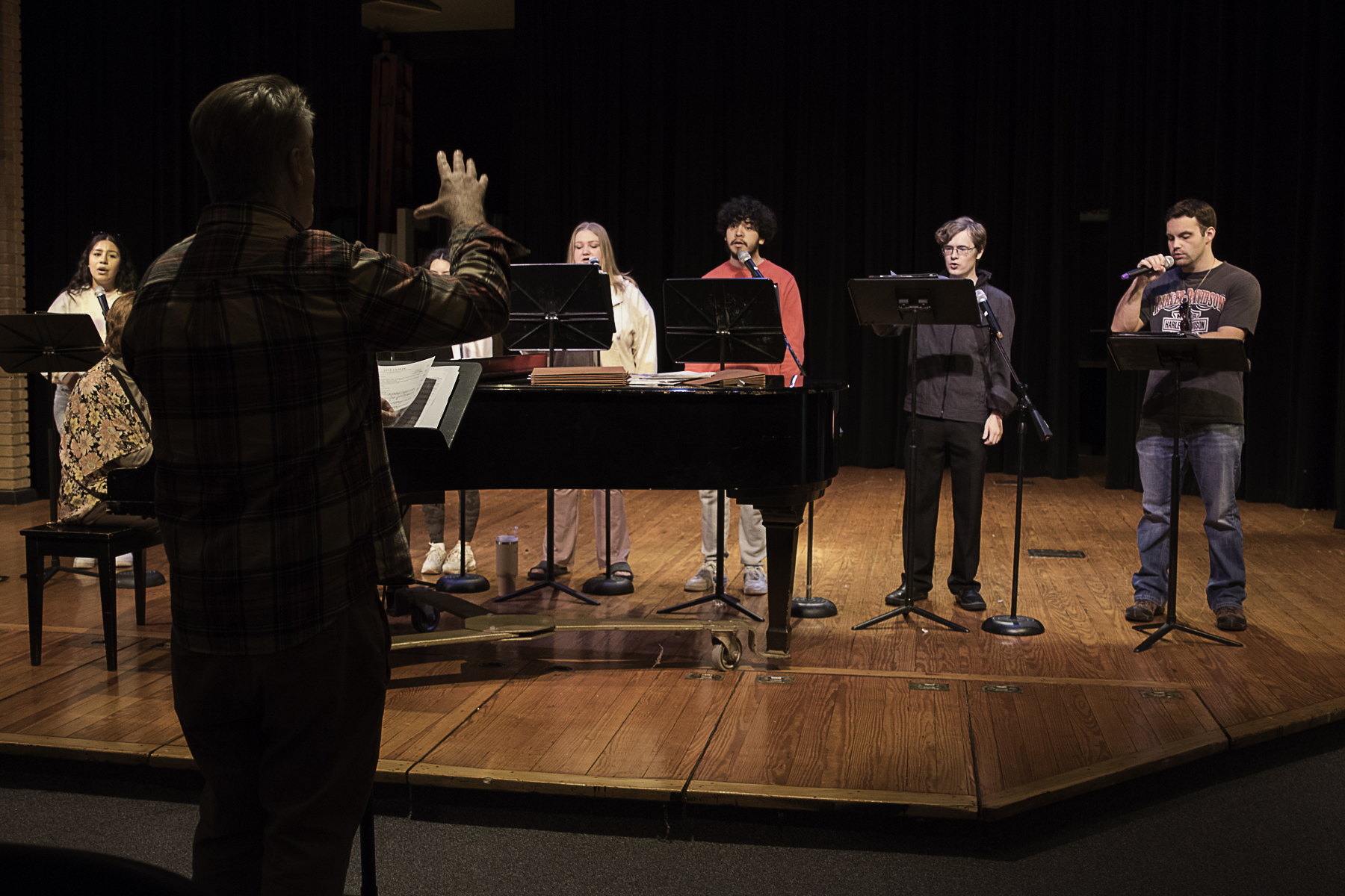 WCJC Choir Director Dr. Karl Paoletti guides choir members through a rehearsal. 