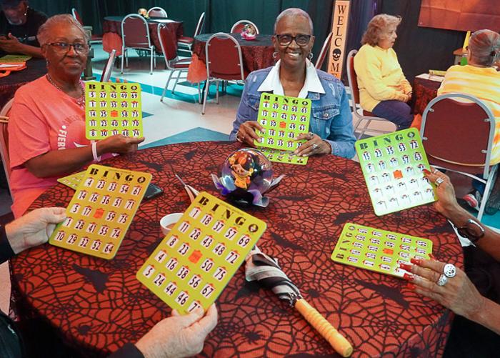 Members of the Wharton County Junior College Senior Citizens Program display their bingo cards during an event held last fall. The program will host a bingo fundraiser from 4 p.m. to 6 p.m. Saturday, Aug. 2, at the Pioneer Student Center on the Wharton campus.