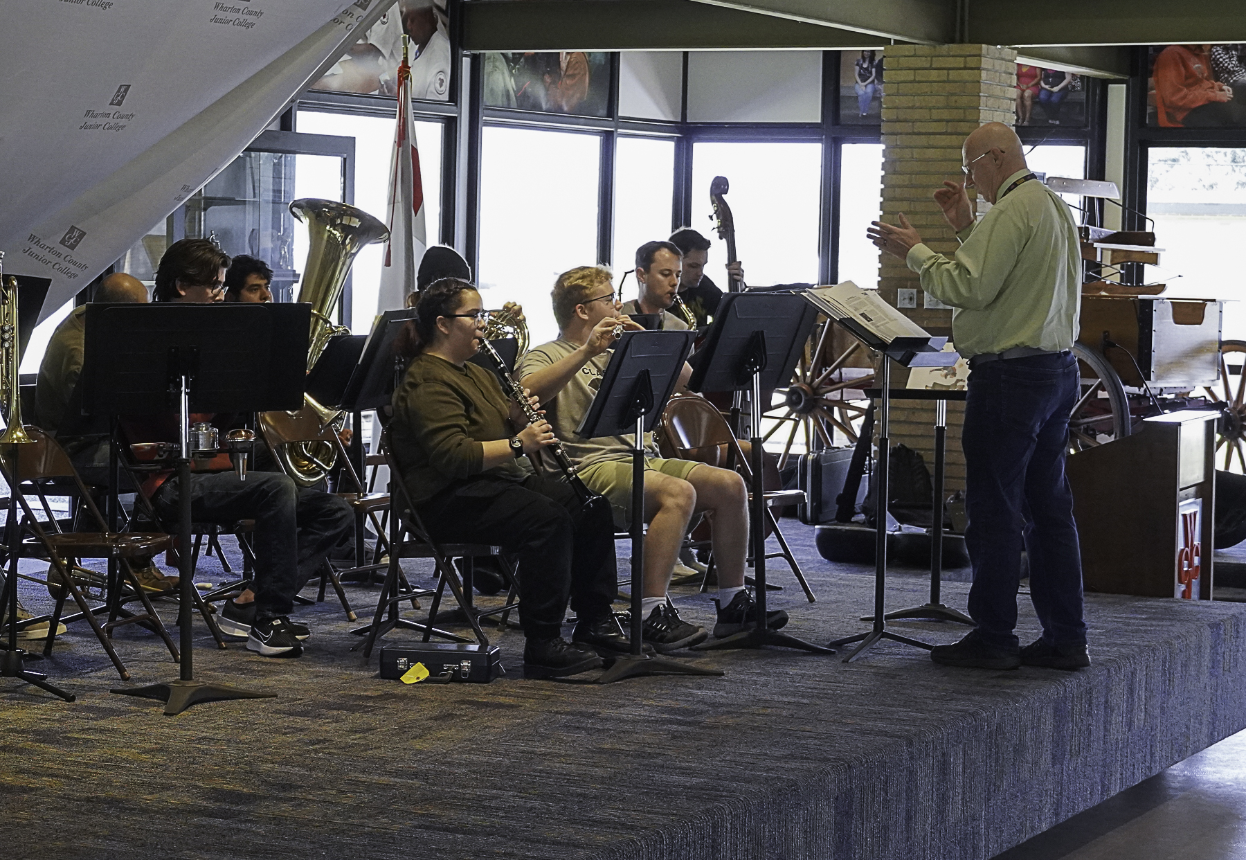 Wharton County Junior College Band members follow Band Director Joe Waldrop's guidance as they rehearse for the upcoming "My Favorite Songs I" concert. Scheduled for two performances on Tuesday, Feb. 11, the show is open to the public and free of admission. 