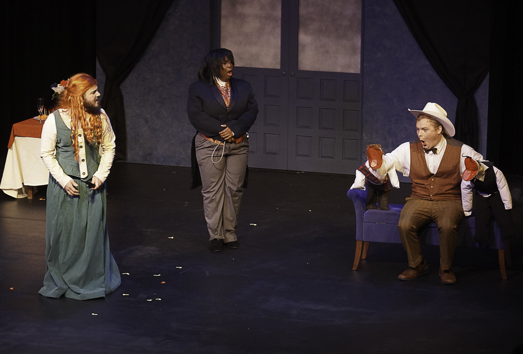 Wharton County Junior College's Drama Department earned an Excellent rating for its production, "Dracula: A Comedy of Terrors," at a recent play festival in Brenham. Shown performing a scene from the play are, from left, Ryan Martin, Valerie Brown and Aidan Meek. 