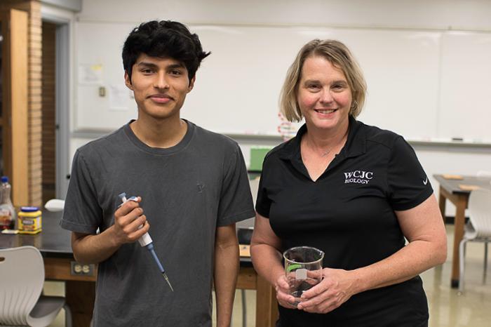 Wharton County Junior College students Philip Salinas of Wallis and Gabriela Medina of Richmond will spend part of this summer conducting scientific research at Rice University. Pictured, from left, are Salinas and WCJC Biology Department Chair Jennifer Mahlmann.