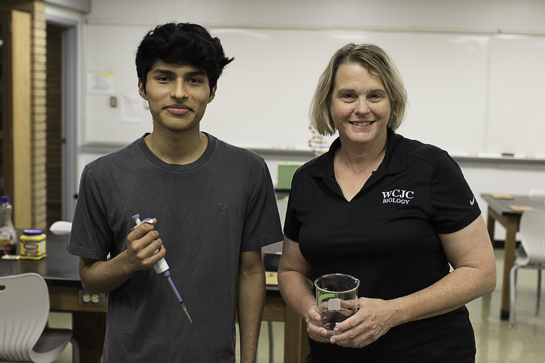 Wharton County Junior College students Philip Salinas of Wallis and Gabriela Medina of Richmond will spend part of this summer conducting scientific research at Rice University. Pictured, from left, are Salinas and WCJC Biology Department Chair Jennifer Mahlmann.