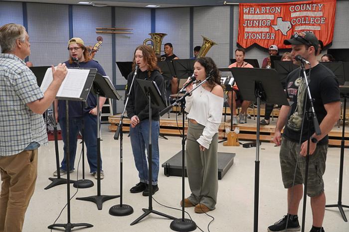 Wharton County Junior College Choir Director Dr. Karl Paoletti leads a rehearsal for the upcoming concert, 