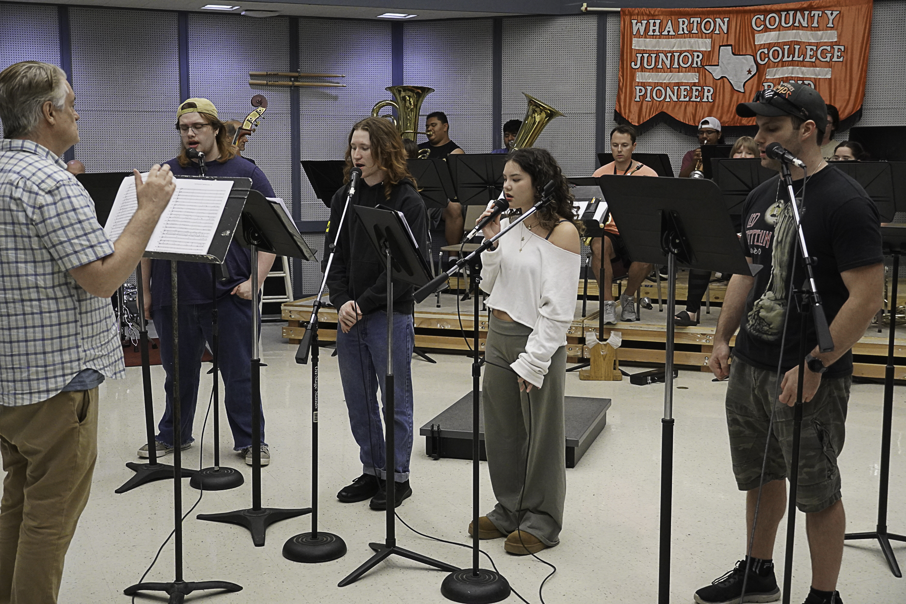 Wharton County Junior College Choir Director Dr. Karl Paoletti leads a rehearsal for the upcoming concert, "The Joint is Jumpin." Students, from left, are Spencer Cole of Needville, Richard Kight of El Campo, Elaina Light of Sugar Land and Riley Henderson of Wharton.