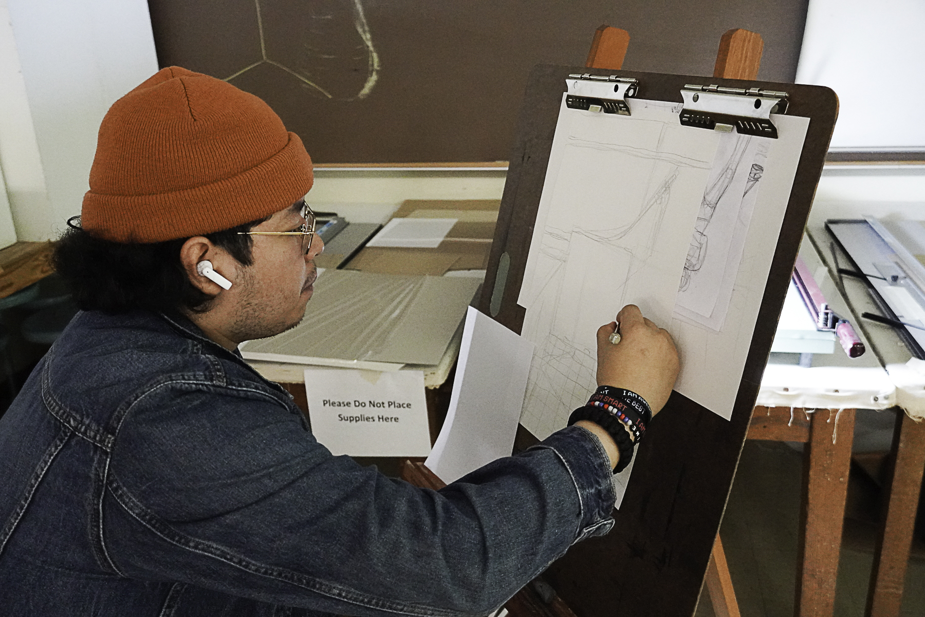 Wharton County Junior College art student Yojani Flores works on a sketch as part of a class assignment. Students' artwork is now on display in the Duson-Hansen Fine Arts Building on the Wharton campus as part of a student art show.